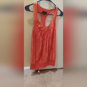Adult woman medium orange sleeveless blouse